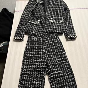Black and white tweed suit
